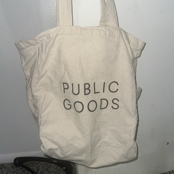 Public Goods Canvas Tote bag. Has 2 inner pockets one zippered, & bottle pocket. - Picture 2 of 4